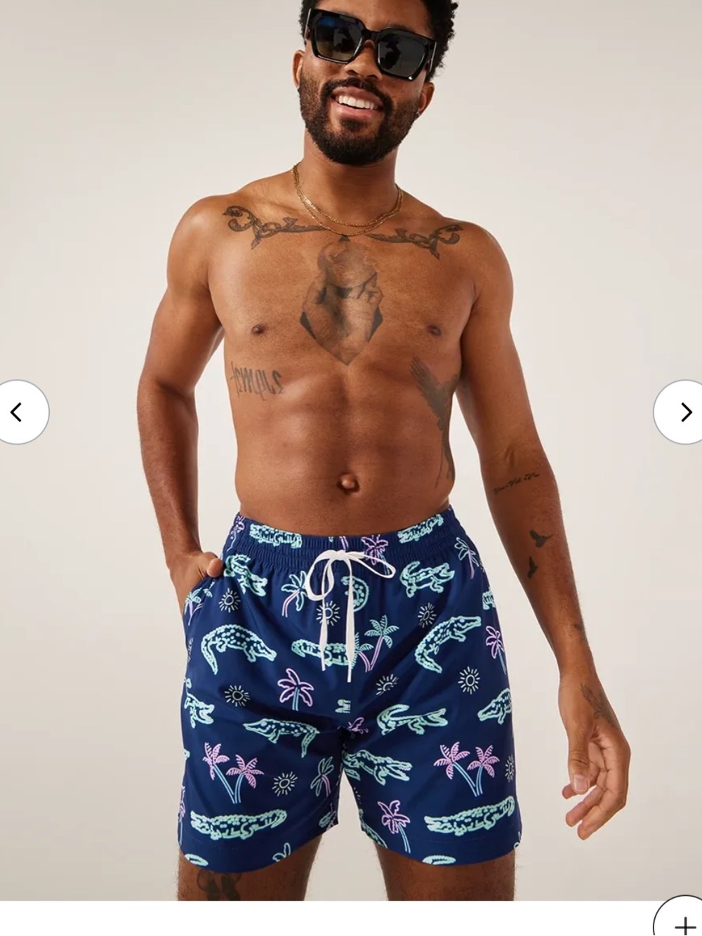 chubbies Navy Swim Trunks with Teal & Light Purple Tropical Print